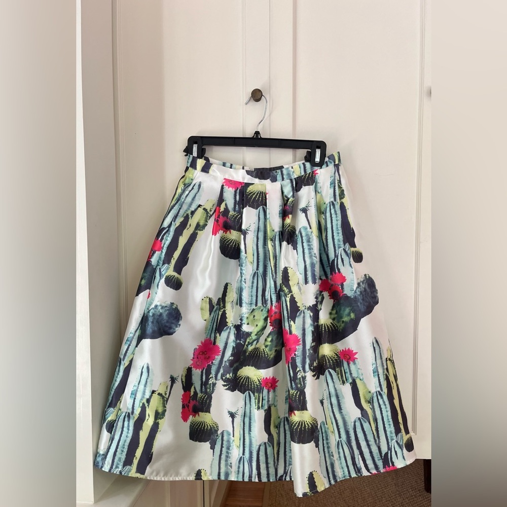 Brand is Blaque Label. Size 4
